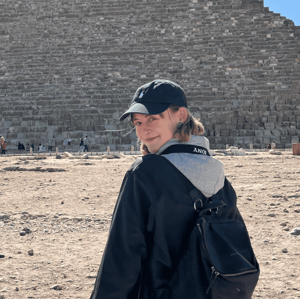 Standing in front of a pyramid in Cairo